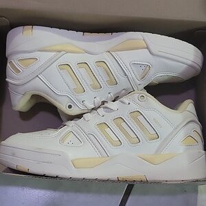 White and Yellow Sneakers